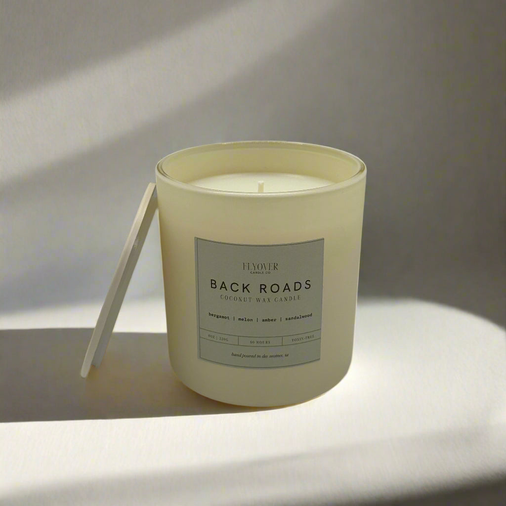 Candle with a label on a white background