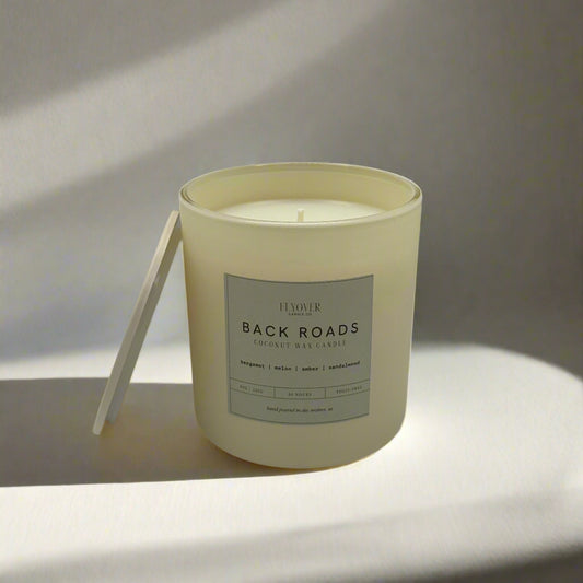 Candle with a label on a white background